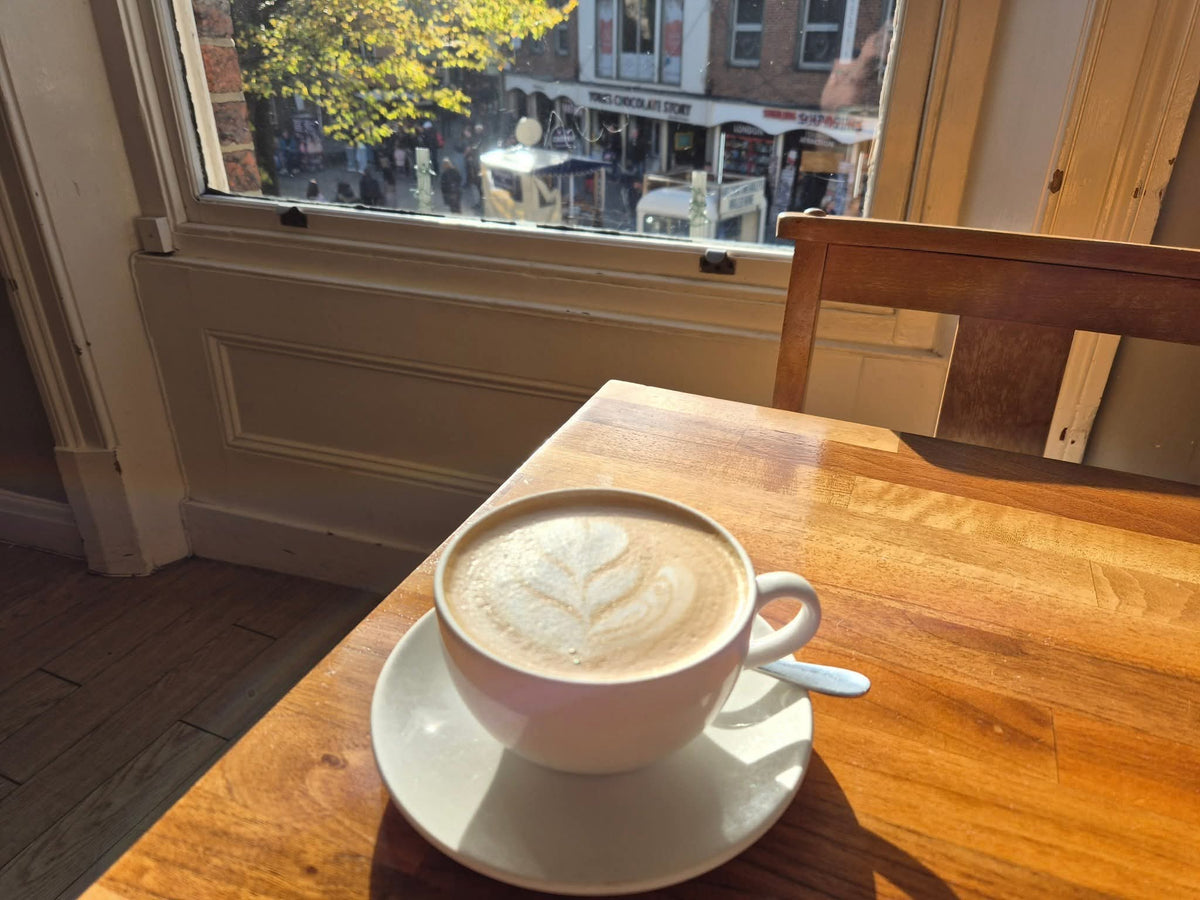 Latte art served at Harlequin Coffee House & Tea Room in York