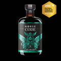 Norse Code Hel Below Coffee Liqueur bottle with a gold award badge on a black background