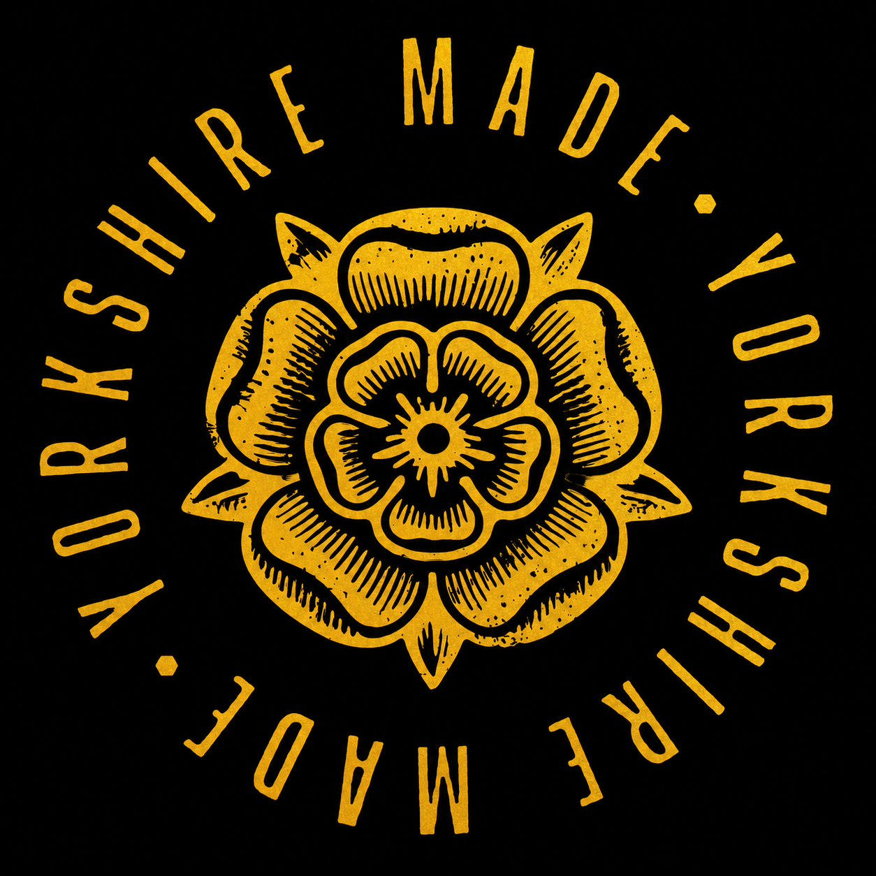 A circular graphic on a black background featuring a yellow-orange stylized flower in the center with the words “YORKSHIRE MADE” repeated around the edge in matching lettering.