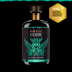 Norse Code coffee liqueur bottle with a gold award badge on a black background